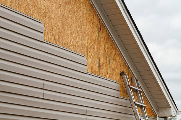 Professional Siding Repair technician working in North Andover, MA
